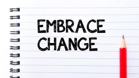 Embrace Change Text written on notebook page, red pencil on the right. Motiva Stock Photos