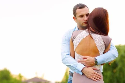 Embracing couple hugging Stock Photos