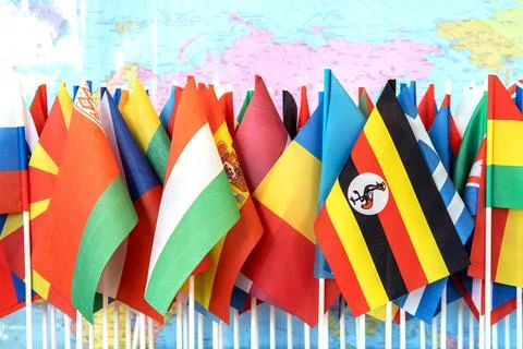 Embracing Diversity: A Tapestry of Nations - Flags of the World Against the Stock Photos