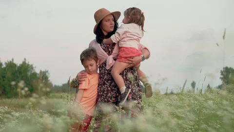 Embracing the Magic of Family Bonds: Capturing the Unforgettable Moments of a Mo 스톡 동영상 245230893