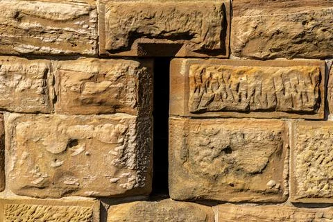 Embrasure inside of the massive high walls of an old medieval castle Photos
