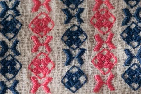 Embroidered pattern on cotton fabric . Stock Photos