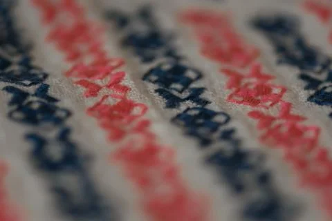 Embroidered pattern on cotton fabric . Stock Photos
