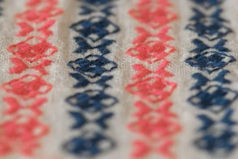Embroidered pattern on cotton fabric . Stock Photos