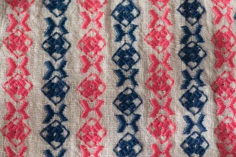 Embroidered pattern on cotton fabric . Stock Photos