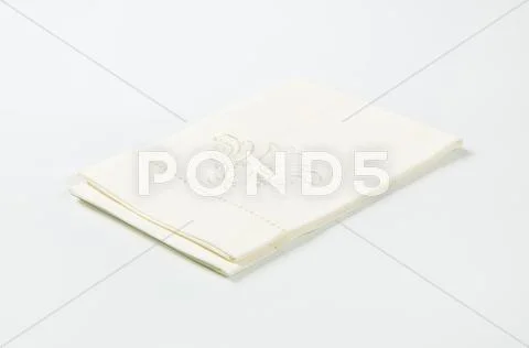 Embroidered white napkin Stock Photos