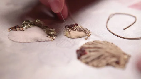 .The embroiderer at work. Couture embroidery of the half shell Stock Footage 146263425