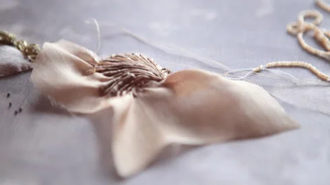 .The embroiderer at work. Couture embroidery of the half shell Stock Footage 146263742