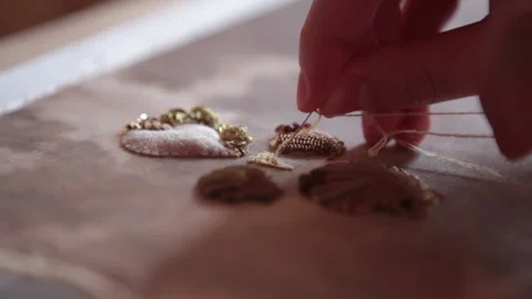 .The embroiderer at work. Couture embroidery of the half shell Stock Footage 146264550