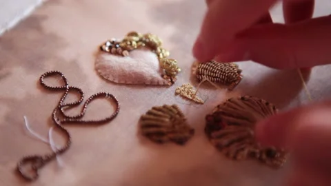 .The embroiderer at work. Couture embroidery of the half shell Stock Footage 146264579