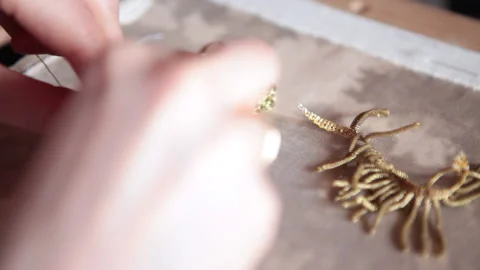 .The embroiderer at work. Couture embroidery of the half shell Stock Footage 146264706