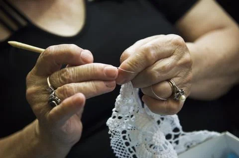 Embroiderer working Stock Photos