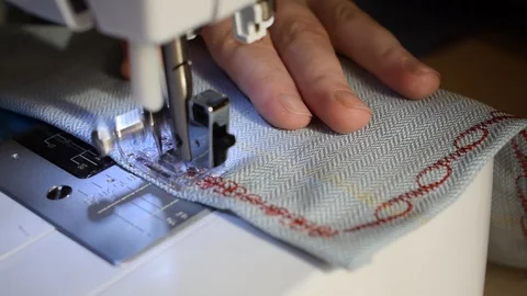 Embroidering patterns on a sewing machine machine Stock Footage 88598666