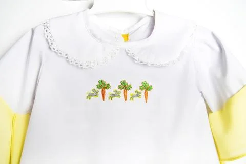 Embroidery on children's clothes, Easter machine embroidery, Stock Photos