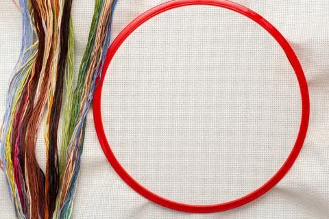 Embroidery frames, embroidery stitching kit with color threads and canvas bac Stock Photos