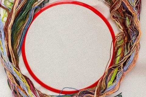 Embroidery frames, embroidery stitching kit with color threads and canvas bac Stock Photos