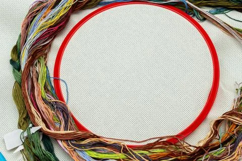 Embroidery frames, embroidery stitching kit with color threads and canvas bac Stock Photos