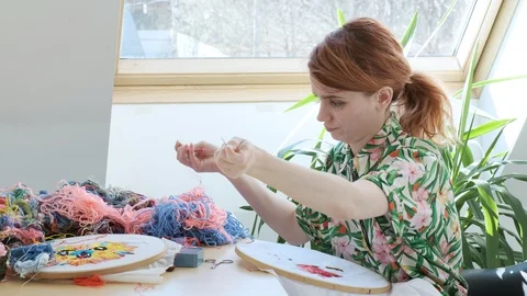 Embroidery hoop, fabric with pattern. Needlework, handicraft. quarantine leisure Stock Footage 129321964
