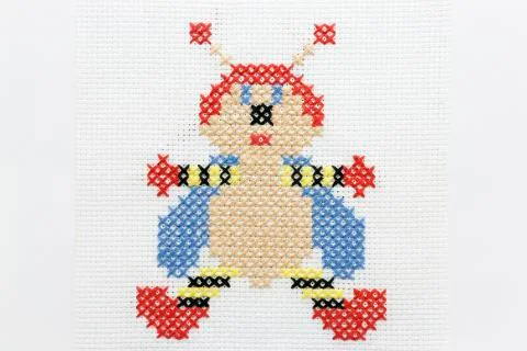 Embroidery of the image of a bee Stock Photos