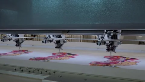 Embroidery machine is creating decorative textile pattern on the fabric Stock Footage 344315057