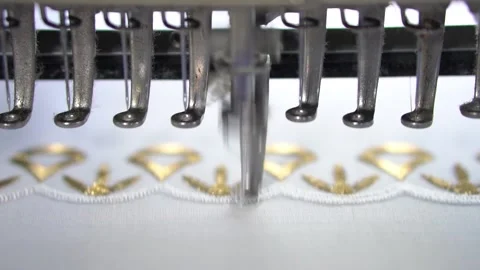Embroidery machine creating textile patterns on cloth e Stock Footage 139093352