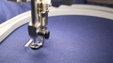 The embroidery machine embroiders the letters Video stock 128197351