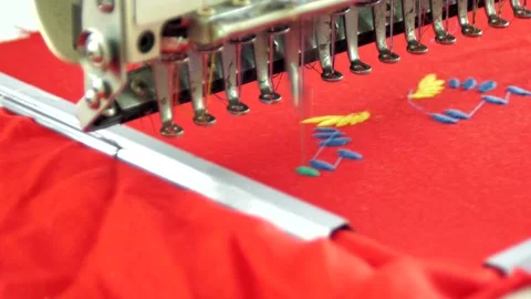 Embroidery machine in progress embroidery Ukrainian national traditional pattern Video stock 218947796