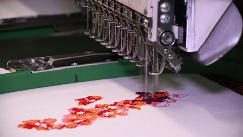 The embroidery machine is used to create patterns on textiles. Video stock 102962358
