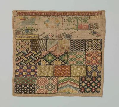 Embroidery patch of linen canvas on which with silk in tapertie stitches 1... Fotos de archivo