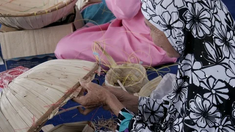 Embroidery process of Nypa palm leaf by local artisan Stock Footage 112152020