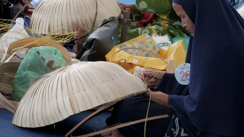 Embroidery process of Nypa palm leaf by local craftswoman Stock Footage 112152145