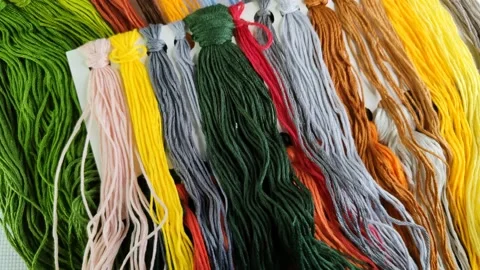 Embroidery threads of different colors close-up 库存影片 180143864