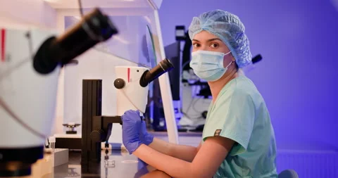 Embryologist Conducting Artificial Fertilization in Laboratory Stock Footage 276422107