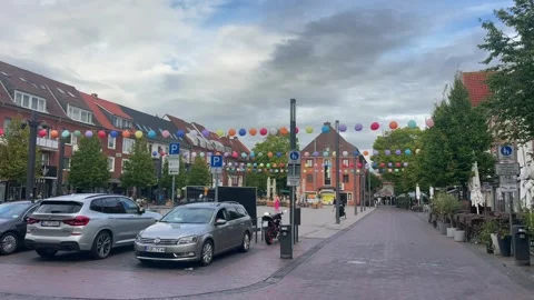 Emden, Germany - August 25, 2026: Central Emden street with cyclists, pedestrian Stock Footage 344391547