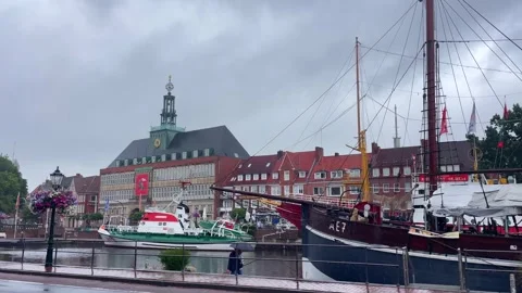 Emden, Germany - August 25, 2026: Emden harbour with historic vessels moored alo Stock Footage 344391594