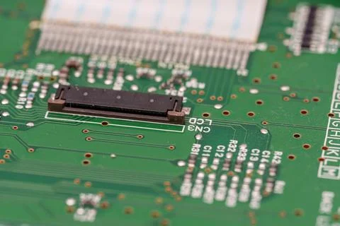 Emerald electronic labyrinth a close-up view of a circuit board with compon.. Stock Photos