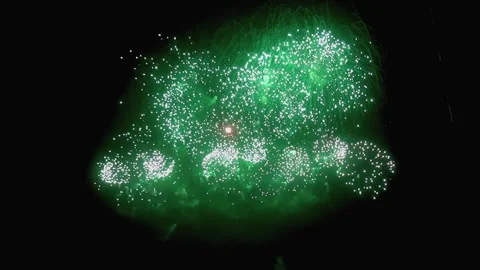 Emerald explosions light up the Dark Night at July Fourth Stock Footage 315744417