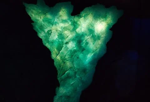 Emerald Glow in Darkness Stock Photos