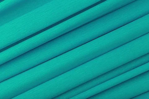 Emerald green abstract background with diagonal lines. Flat lay, copy space Stock Photos