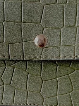 Emerald green bag with lines pattern. Stock Photos