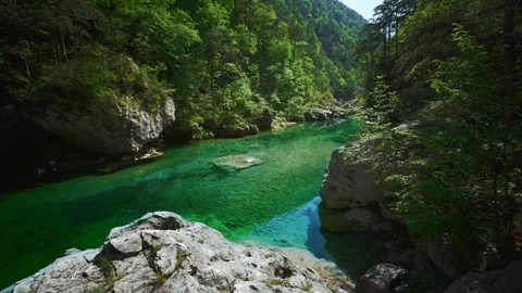 Emerald green river pools, white limestone rocks and natural waterfall at Pozze Stock Footage 340826539