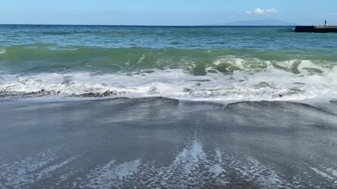 Emerald Green Waves Lapping on a Sunny Coastline7 Stock Footage 288091372