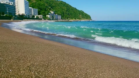 Emerald Green Waves Lapping on a Sunny Coastline4 Video stock 288095087