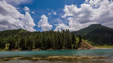 Emerald Lake Mountains Clouds Stock Footage 31741204
