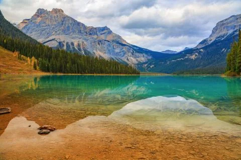 Emerald lake reflections Stock Photos