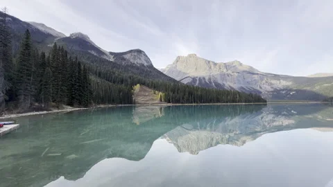 Emerald Lake with Reflective Waters and Mountain Backdrop - Canadian Rockies Stock Footage 345451840