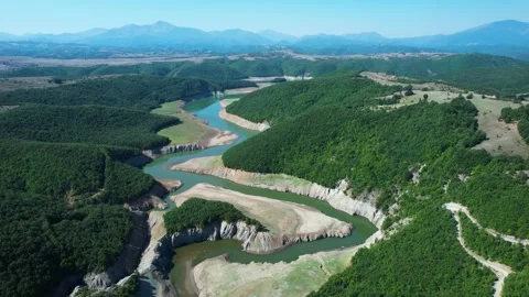 Emerald lakes and rivers of Koman Fierza with Lumi i Shales beautiful mountain Stock Footage 344907418