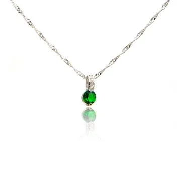 Emerald pendant isolated on white Stock Photos