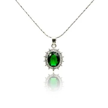 Emerald pendant isolated on white Stock Photos