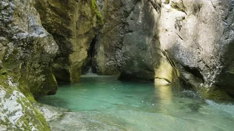 Emerald River Flowing Through Narrow River Gorge With Green Moss on The Walls. Stock Footage 168497722